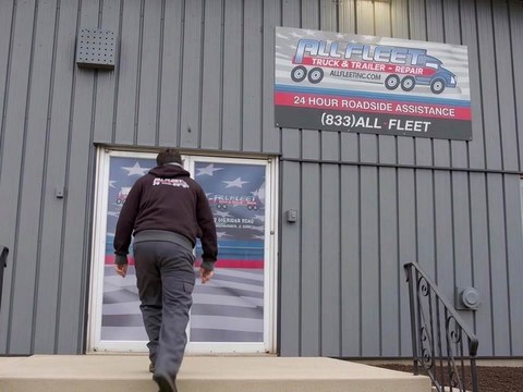 All Fleet Inc team member walking into an All Fleet Inc shop